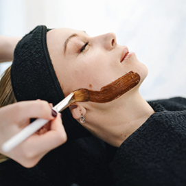 Client receiving a facial