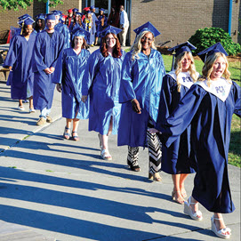 Graduates walking into ceremony